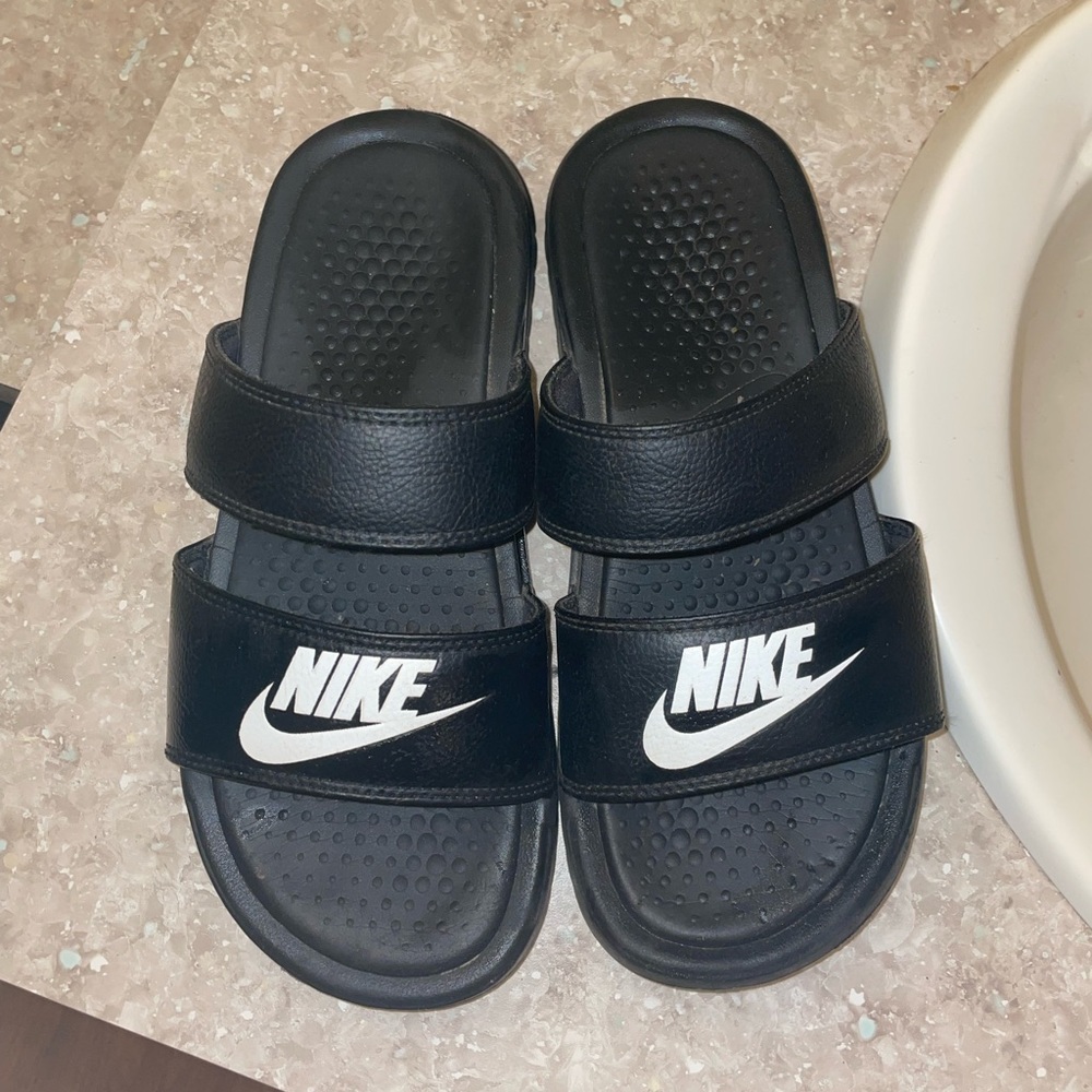 Women’s size 5.5 Nike slides